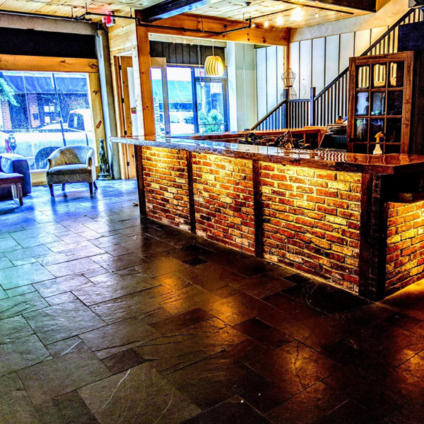 Loft On Passyunk Reclaimed Brick Bar and Lounge Area